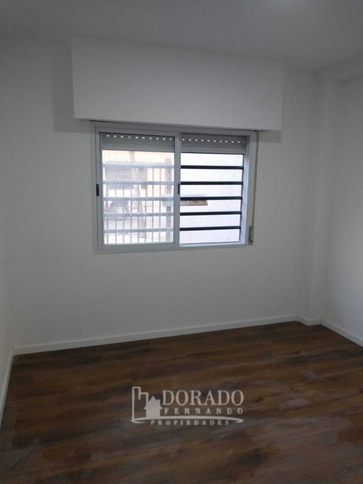 2 AMBIENTES PB CON COCHERA Y PATIO CON PARRILLA