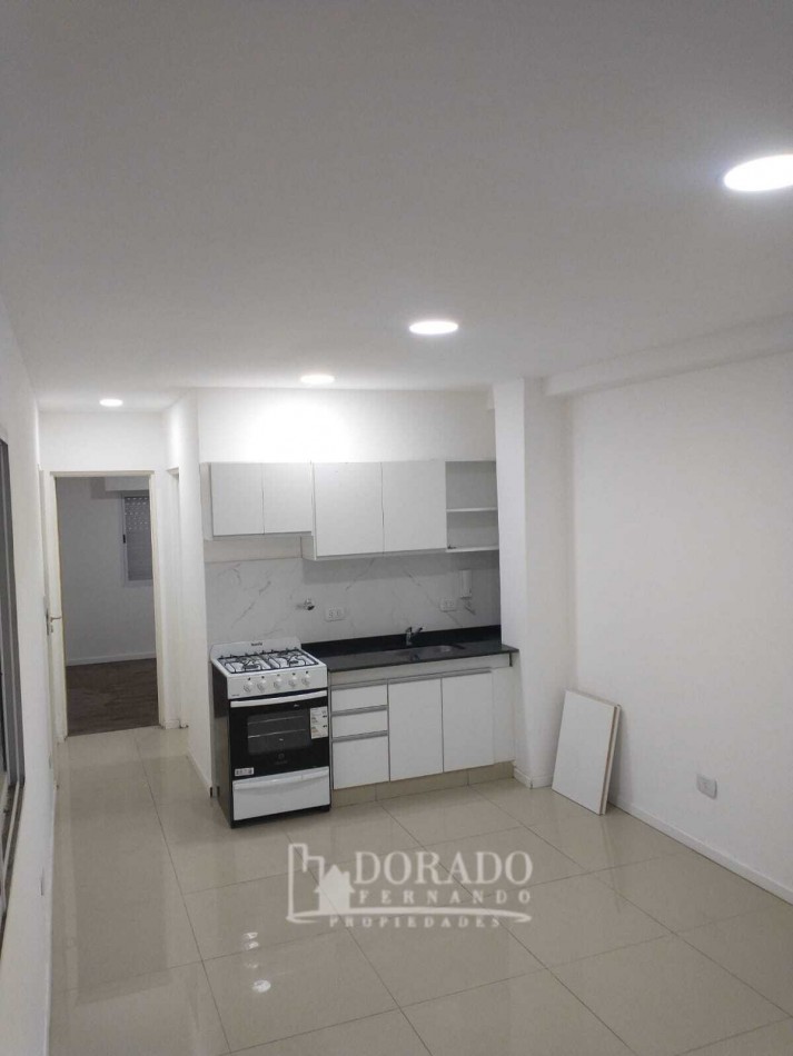 2 AMBIENTES PB CON COCHERA Y PATIO CON PARRILLA